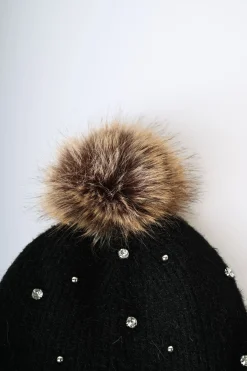 Berretto con pompon e strass