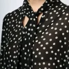 Blusa a stampa pois
