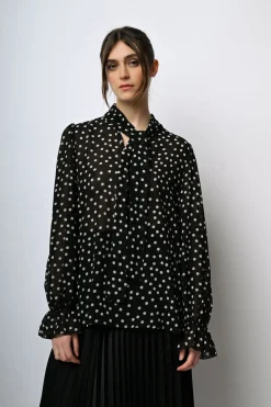 Blusa a stampa pois