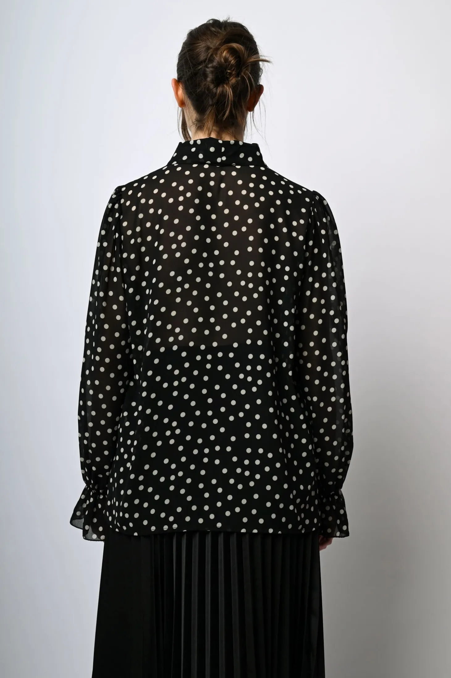Blusa a stampa pois