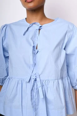 Blusa con laccetti