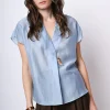Blusa in mussola con scollo a V