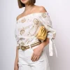 Blusa in pizzo Sangallo con spalle scoperte