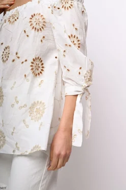 Blusa in pizzo Sangallo con spalle scoperte