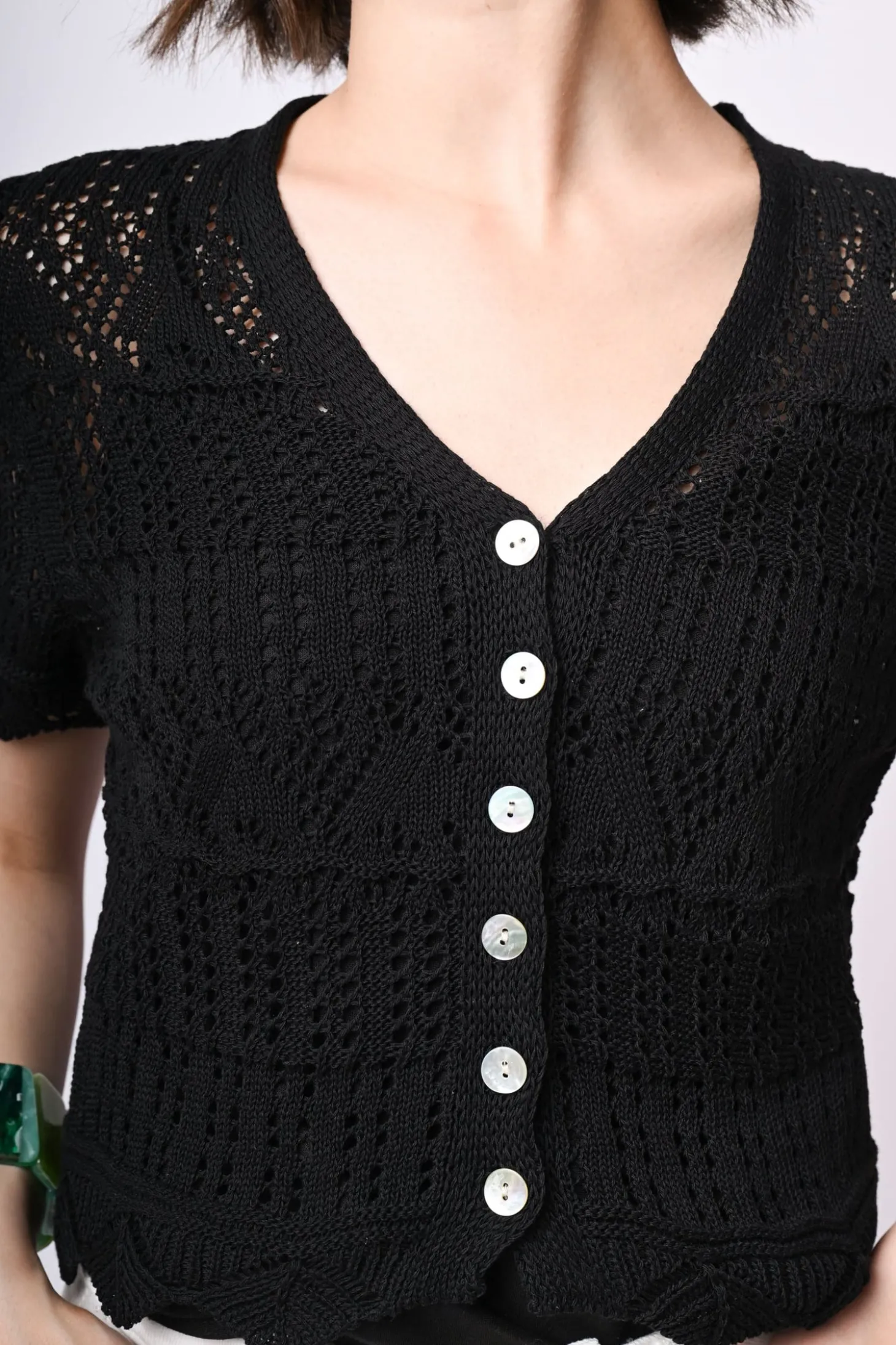 Cardigan crochet a maniche corte