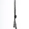 Collana lunga con perline e nodo