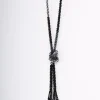 Collana lunga in perline con nodo