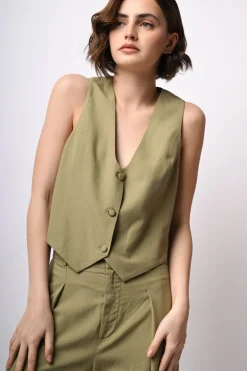 Gilet con bottone rivestito