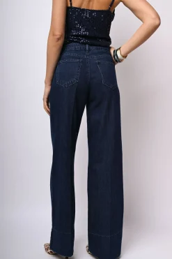 Jeans a gamba ampia con risvolto