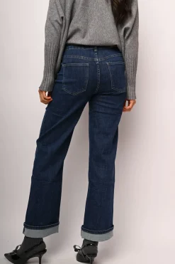 Jeans a gamba ampia con risvolto