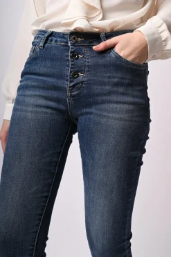 Jeans skinny con bottoni