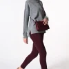 Jeans skinny con bottoni gioiello