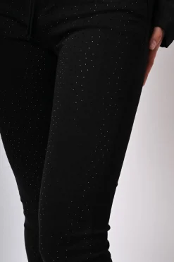 Pantaloni skinny con glitter
