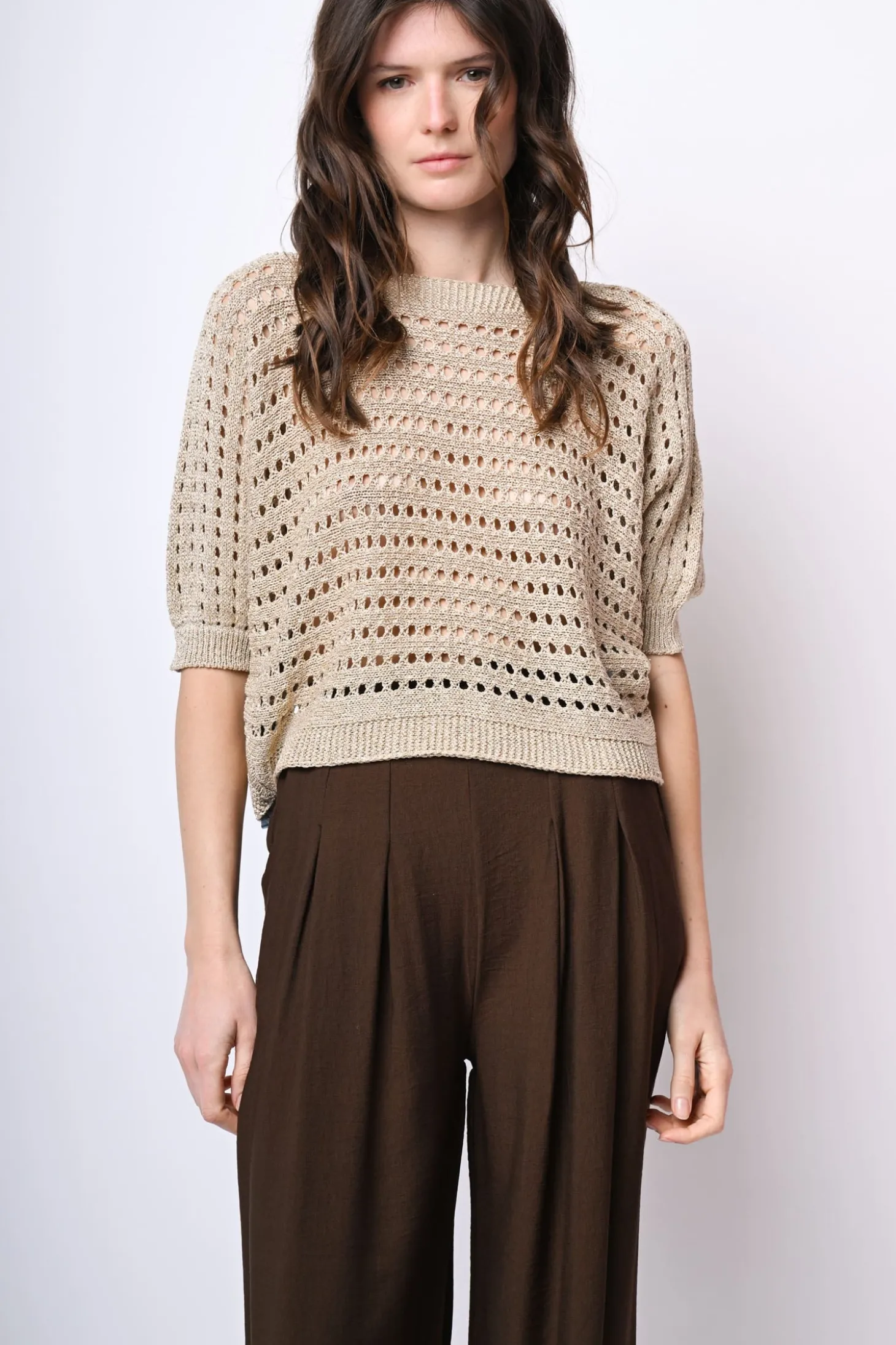Pull in maglia crochet con fiocco sul retro