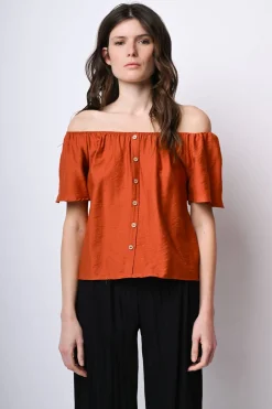 Top a spalle scoperte con bottoni