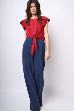 Top crop con nodo alla vita
