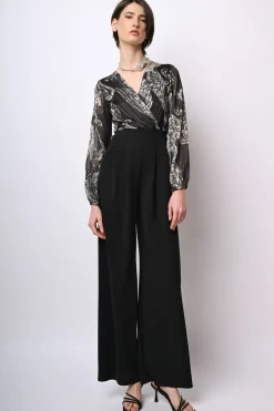 Tuta bi-materiale con stampa paisley