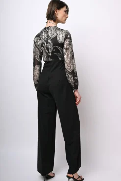 Tuta bi-materiale con stampa paisley